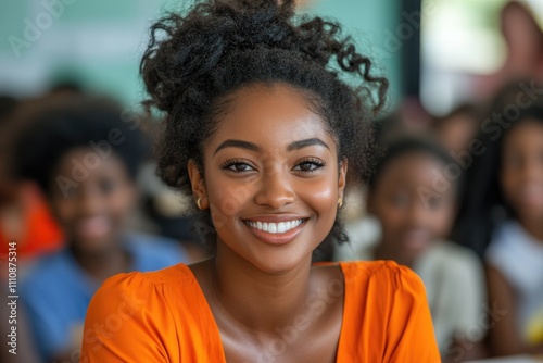 Smiling teacher posing with students in classroom in developing country