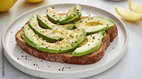 Photo of, A clean-cut avocado toast sprinkled with sea salt and black pepper, Minimalist backdrop