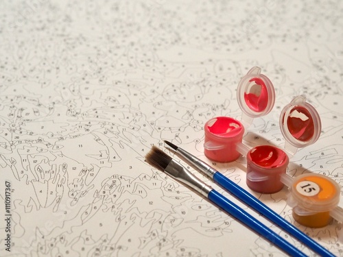 An intricate paint by numbers canvas accompanied by labeled paint pots and brushes, designed to guide artists in creating a detailed and satisfying masterpiece.