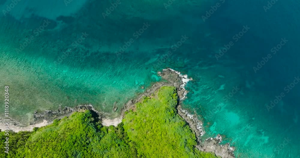 Waves over rocky coastline. Greenish sea water in El Nido, Palawan. Philippines. Waves over rocky coastline. Greenish sea water in El Nido, Palawan. Philippines.