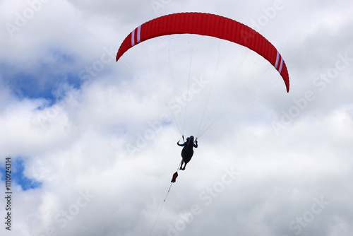 Paraglider being towed by a winch 