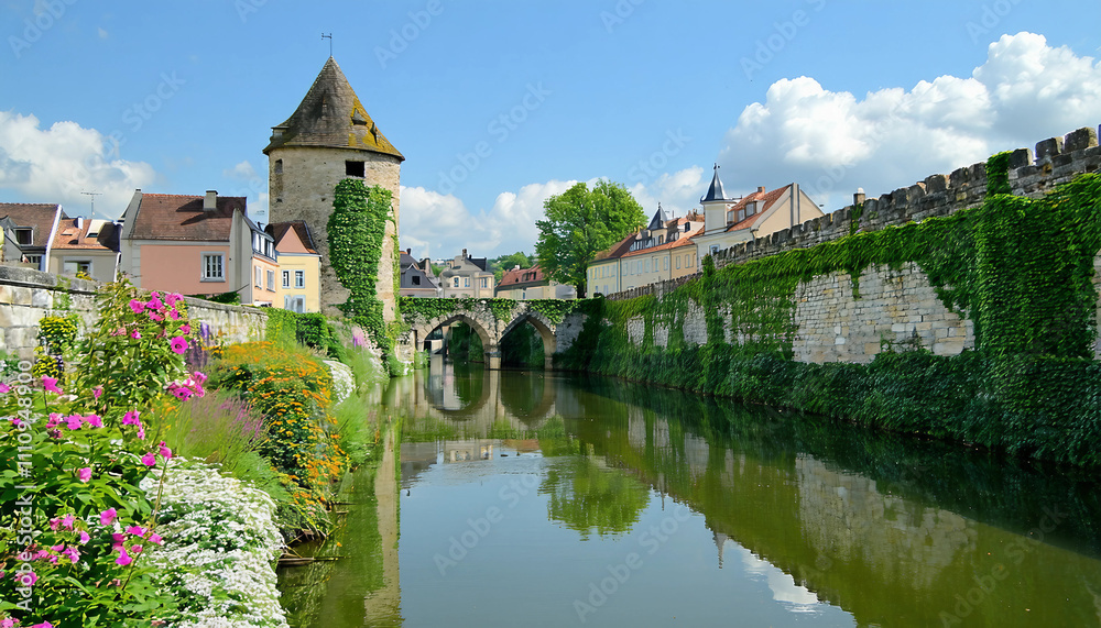 Fototapeta premium A picturesque, realistic photo of a historic European castle with ivy-covered stone walls, archways