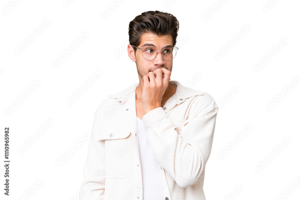 Young handsome caucasian man over isolated background nervous and scared