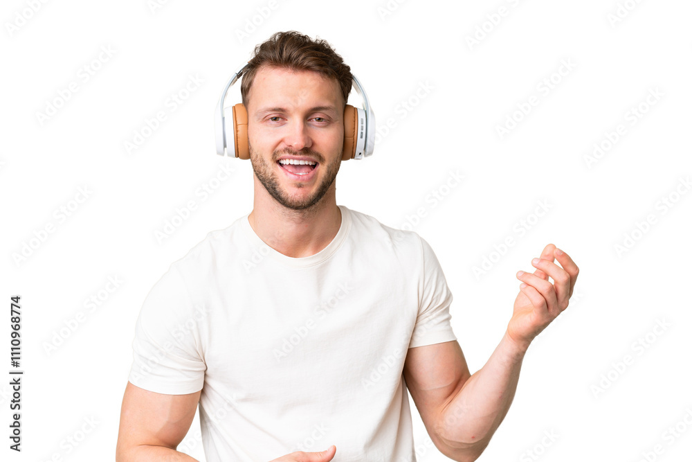 Young handsome caucasian man over isolated chroma key background listening music and doing guitar gesture Young handsome caucasian man over isolated chroma key background listening music and doing guitar gesture