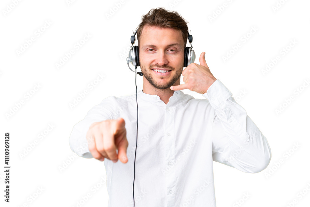Telemarketer caucasian man working with a headset over isolated chroma key background making phone gesture and pointing front Telemarketer caucasian man working with a headset over isolated chroma key background making phone gesture and pointing front