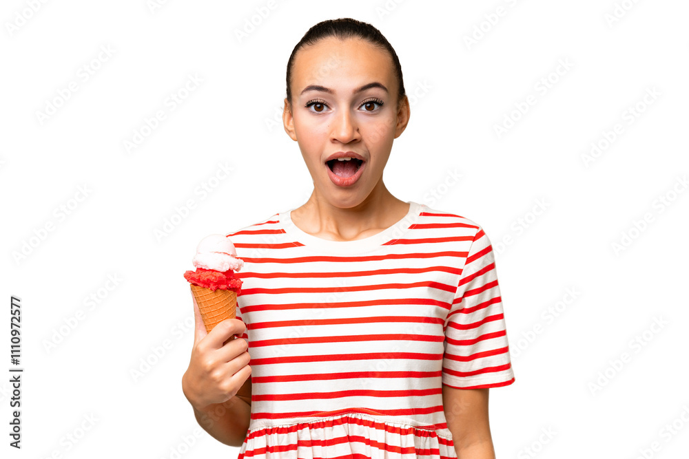 Young Arab woman with a cornet ice cream over isolated background with surprise facial expression Young Arab woman with a cornet ice cream over isolated background with surprise facial expression