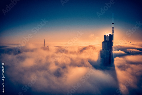 Obraz na płótnie Beautiful panoramic fabulous, mesmerizing, unreal, aerial drone view of skyscrapers sticking out of low fog at sunrise, Warsaw, Poland, EU. VARSO - the tallest skyscraper in EU. w salonie