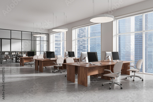 Modern open office space with wooden desks, ergonomic chairs, and large windows overlooking city skyline, with gray concrete floor. 3D Rendering