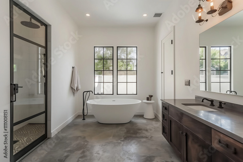Rustic modern bathroom featuring a freestanding bathtub  wooden vanity  and industrial glass shower door  illuminated by soft natural light for a cozy and stylish atmosphere