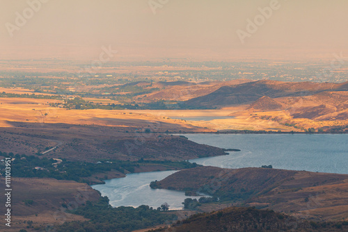 Sunset over Joghaz Water Reservoir in the Caucasus Mountain. Armenia. photo