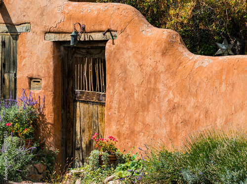 Flowers and Southwest Adobe Architecture on Canyon Road, Santa Fe, New Mexico, USA
