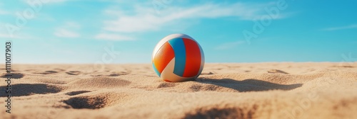 Sunset illumination on a beach with a single ball resting on warm sand photo