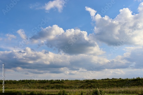 Fototapeta Naklejka Na Ścianę i Meble -  The white clouds in the blue sky.