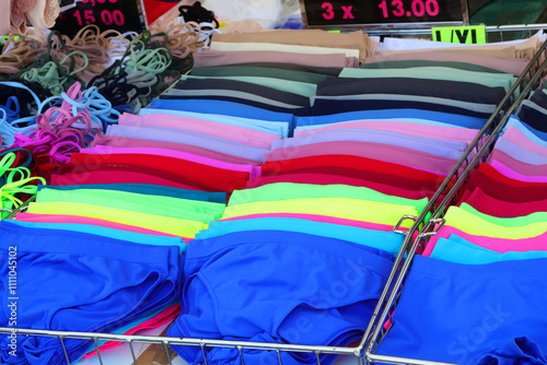 Принти на полотні intimate apparel store with men's and women's underwear and briefs in vibrant co