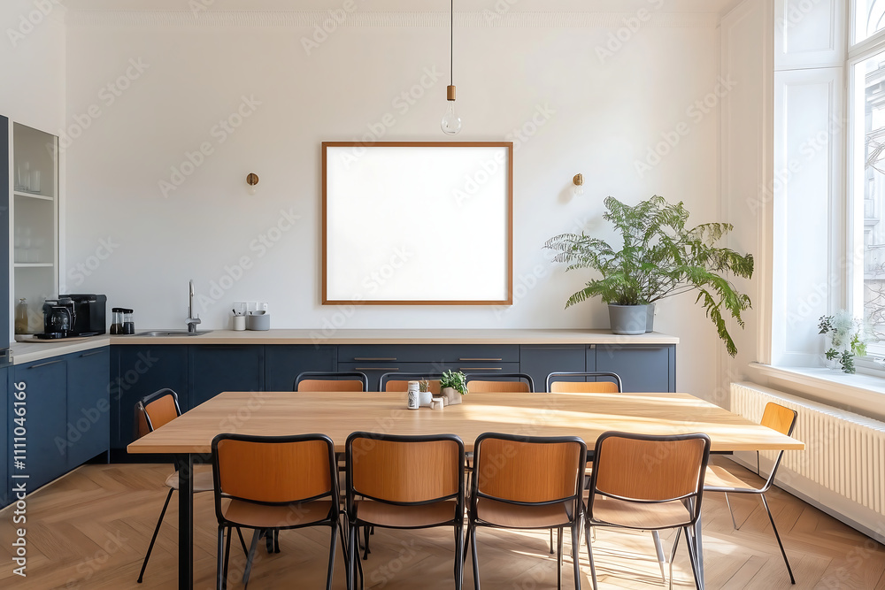 Bright minimalist kitchen with a large wooden dining table, mock-up frame on the wall, and vibrant greenery for a fresh and welcoming atmosphere