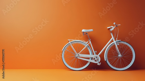 Stylish White Bicycle Against Vibrant Orange Background for Modern Lifestyle and Urban Transportation Themes photo