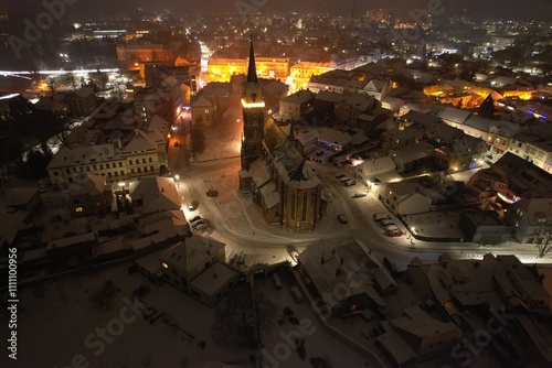 Aerial night panorama of Nymburk town illuminated with Christmas lights and festive decorations, creating a magical holiday atmosphere in this historic town photo