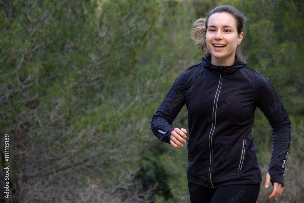 Beautiful Caucasian white girl running at forest trial. Healthy lifestyle young warming up outdoors Beautiful Caucasian white girl running at forest trial. Healthy lifestyle young warming up outdoors