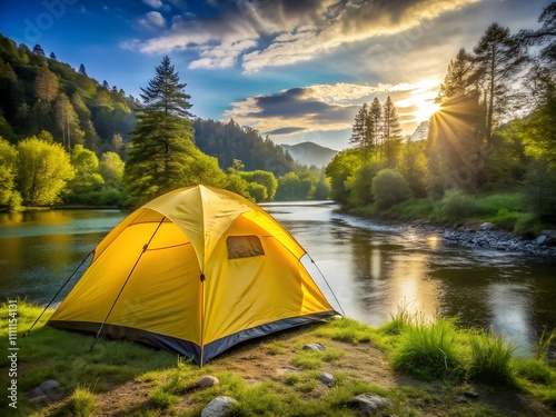 A bright yellow tent sits on the riverbank, surrounded by lush greenery and tall trees. The sun sets behind majestic mountains, casting a golden glow across the tranquil water
