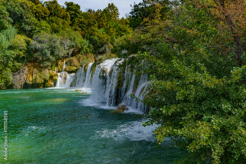 Beautiful view of the waterfalls covered in a dense forest