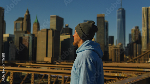 Photography A man standing with Manhattan skyline views in New York City, USA