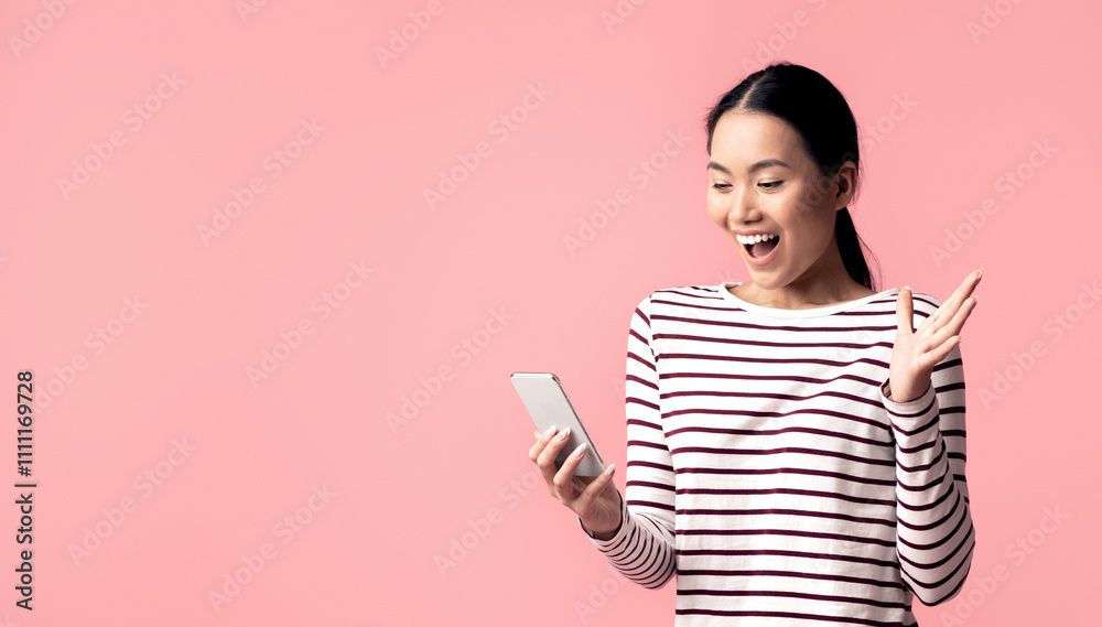 Surprised Young Asian Woman Looking At Smartphone In Her Hand And Exclaiming With Excitement, Cheerful Korean Female Amazed By Mobile Offer Or New App While Standing Over Pink Background, Copy Space Surprised Young Asian Woman Looking At Smartphone In Her Hand And Exclaiming With Excitement, Cheerful Korean Female Amazed By Mobile Offer Or New App While Standing Over Pink Background, Copy Space