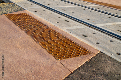new bike trail or sidewalk crossing with railroad tracks