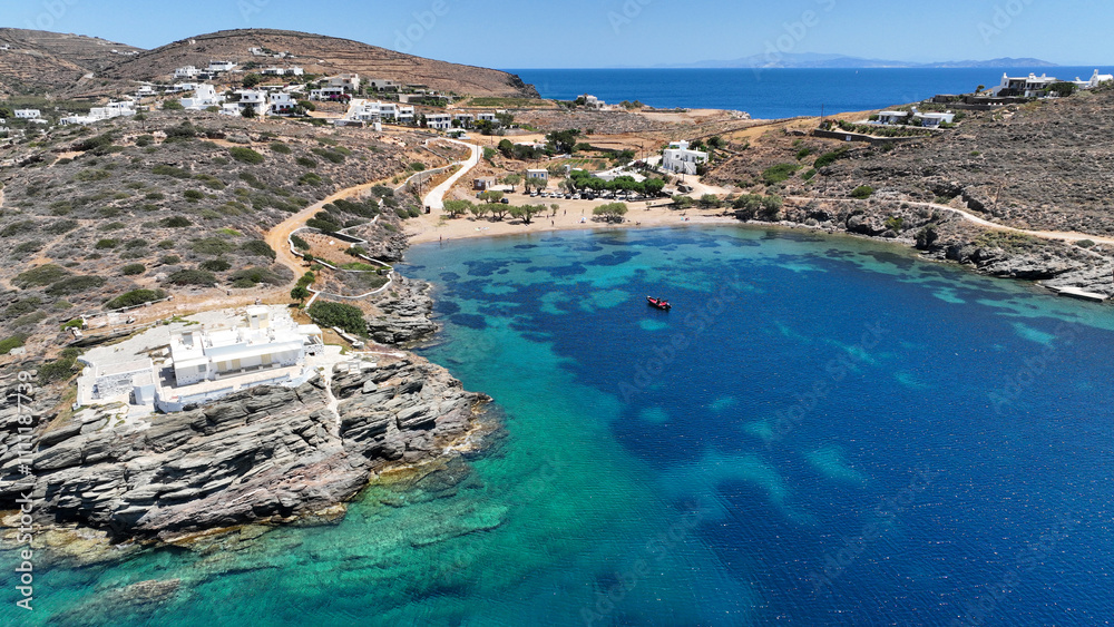 Aerial drone photo of small beach of Fasolou next to famous and picturesque seaside fishing village of Faros, Sifnos island, Cyclades, Greece