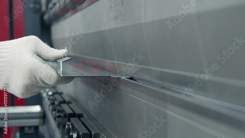 A highly skilled technician carefully bending a sheet of metal using stateoftheart advanced machinery available