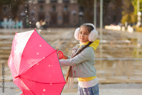 Cute little girl with umbre...