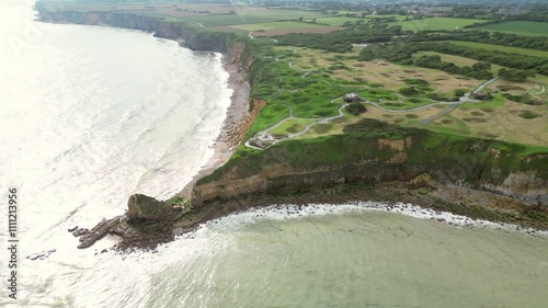 Aerial footage of bunkers and bomb craters at pointe du Hoc, France photo