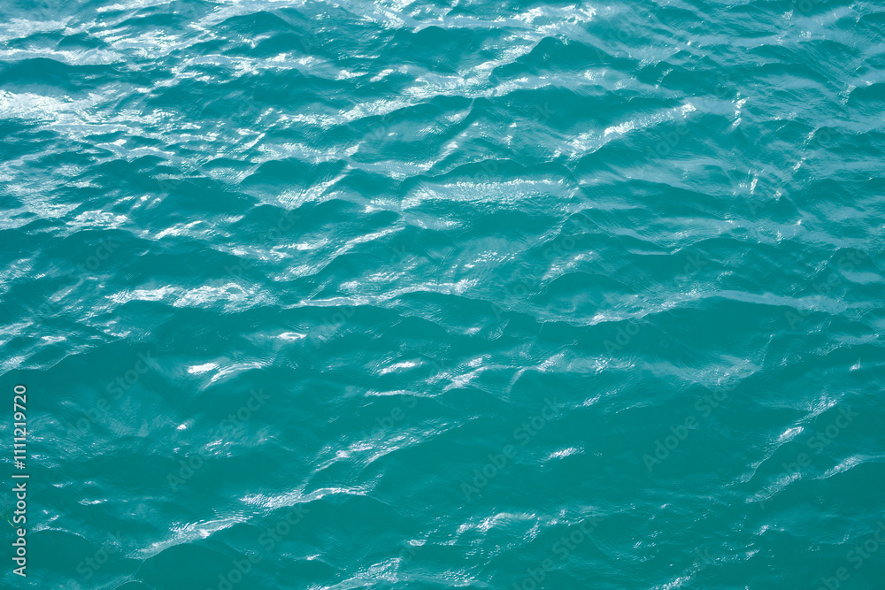 Ocean surface. Blue water texture. Close up blue water surface. Sea surface aerial view. Blue ocean surface. Blue water. Pattern texture. Ocean surface. Blue water texture. Close up blue water surface. Sea surface aerial view. Blue ocean surface. Blue water. Pattern texture.