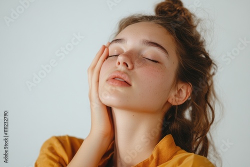 Young Latina Woman Relaxing with Neck Cracking Adjustment on Clean White Background