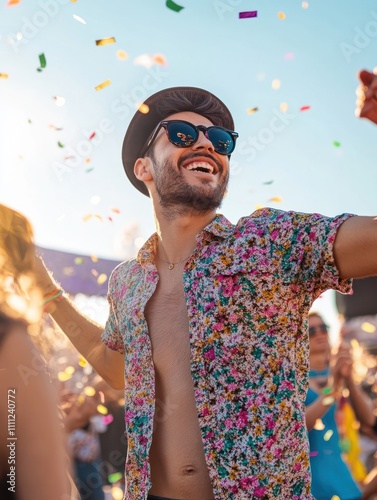 Happy young people dancing outdoor at festival event - Focus on asian man face photo