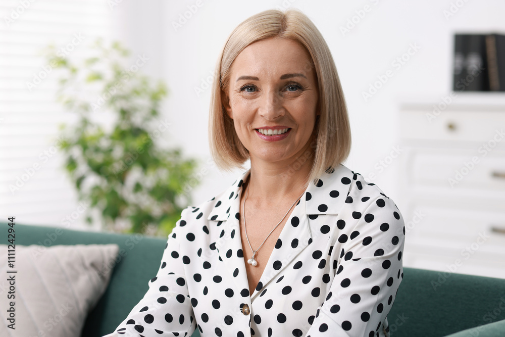 Portrait of smiling middle aged woman at home Portrait of smiling middle aged woman at home