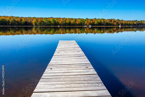 Colorful trees and a pier on the Wisconsin River in early October