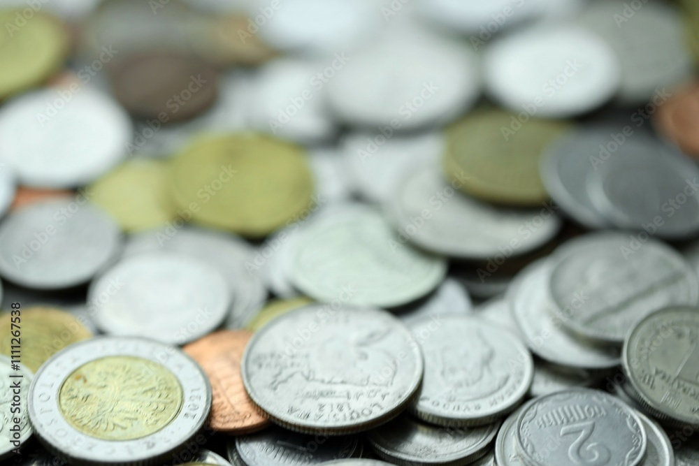Big pile of different coins from various currencies and different countries around the world. Currency exchange Big pile of different coins from various currencies and different countries around the world. Currency exchange