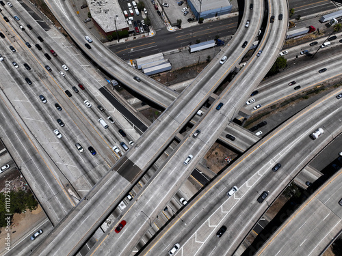 JUNE 6, 2022, LOS ANGELES, CA., USA - aerial view of freeways and downtown Los Angeles with Convention Center in foreground - 110 Harbor freeway