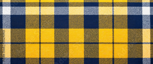 Yellow and navy plaid pattern fabric texture