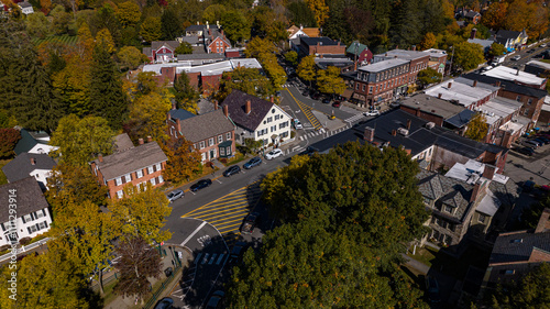 OCTOBER, 2022, WOODSTOCK, VERMONT, USA - aerial view of homes of scenic Woodstock Vermont, New England in autumn color photo