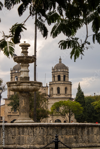 view of the church and fountain in the plaza of cajamarca