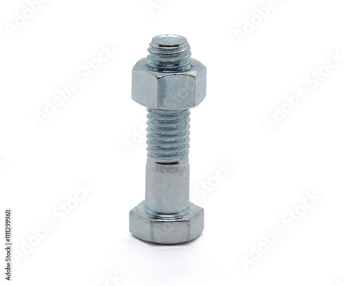 A zinc plated hex bolt standing on its head with a nut threaded on the bottom.