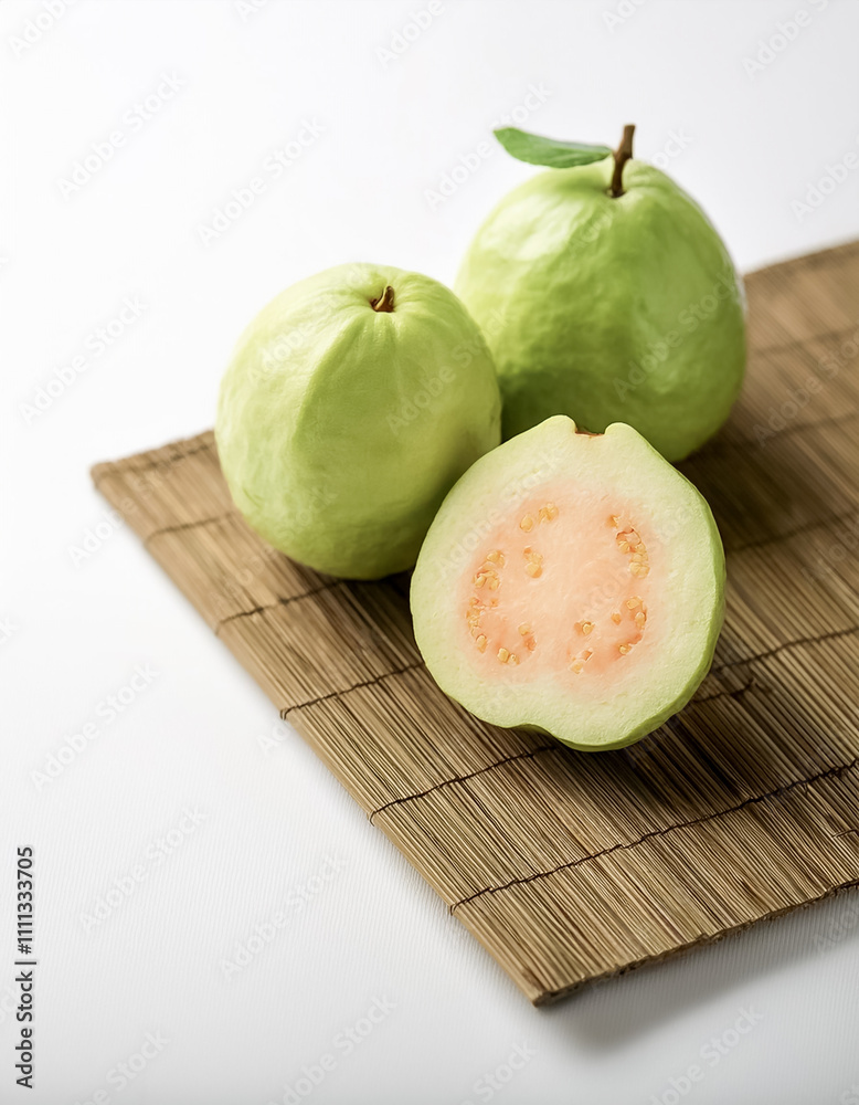 guava fruit, peeled or cut on a natural white guava fruit, peeled or cut on a natural white