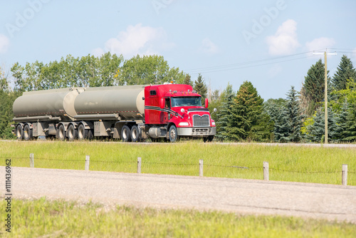 Heavy Cargo on th eroad. A truck hauling freight along a highway. Taken in Alberta, Canada