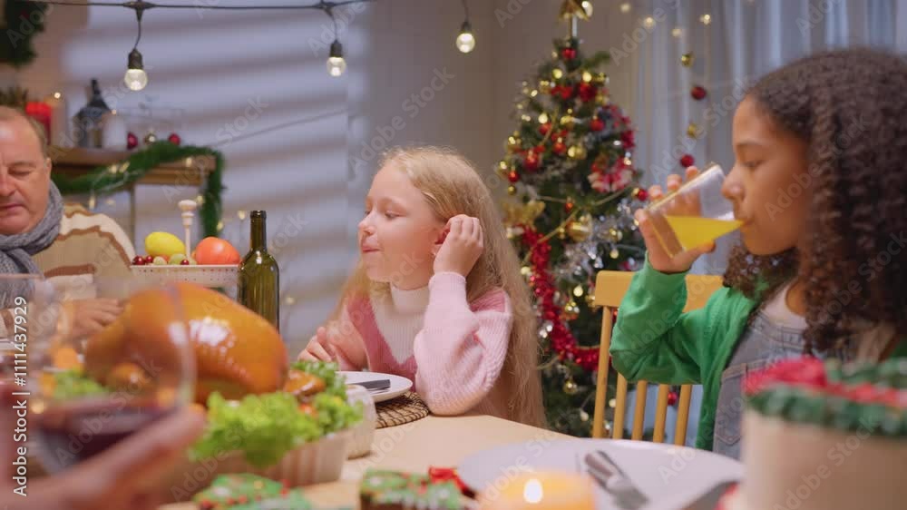 Multiracial lovely children celebrating Christmas party together in house. Multiracial lovely children celebrating Christmas party together in house.