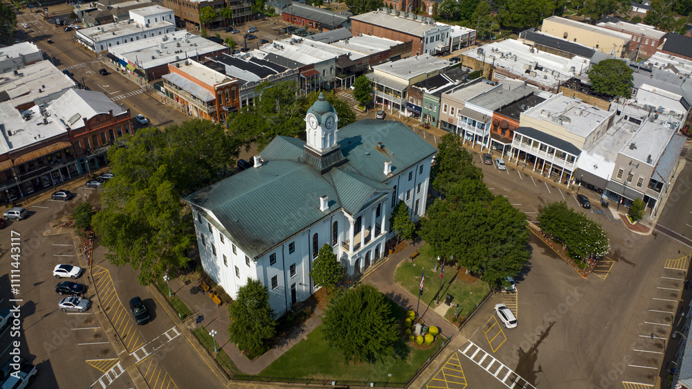 JULY 8, 2023, OXFORD, MS., USA - town courthouse and surrounding stores in historic ole' Miss hometown of University and symbol of south JULY 8, 2023, OXFORD, MS., USA - town courthouse and surrounding stores in historic ole' Miss hometown of University and symbol of south
