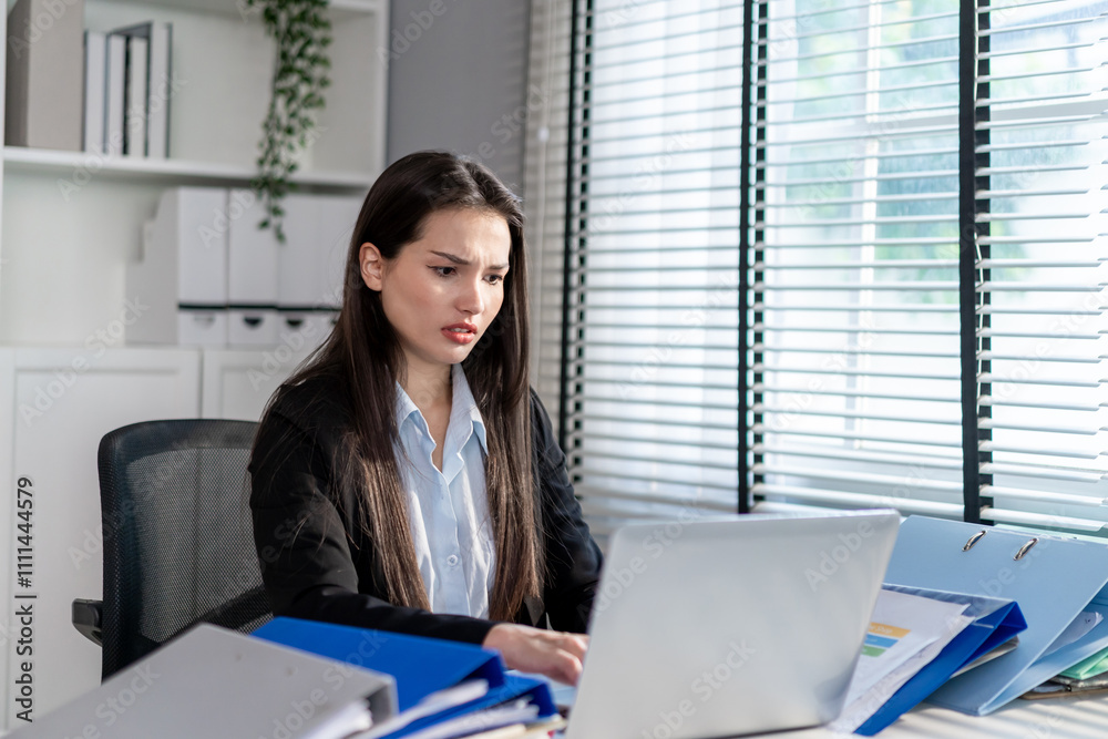 Frustrated Mixed race businesswoman overwork late in office workplace. Frustrated Mixed race businesswoman overwork late in office workplace.