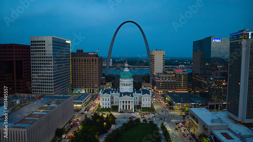 JULY 4, 2023, ST. LOUIS, MO., USA - dusk on St. Louis skyline featuring old Courthouse and Gateway Arch on July 4 before fireworks photo