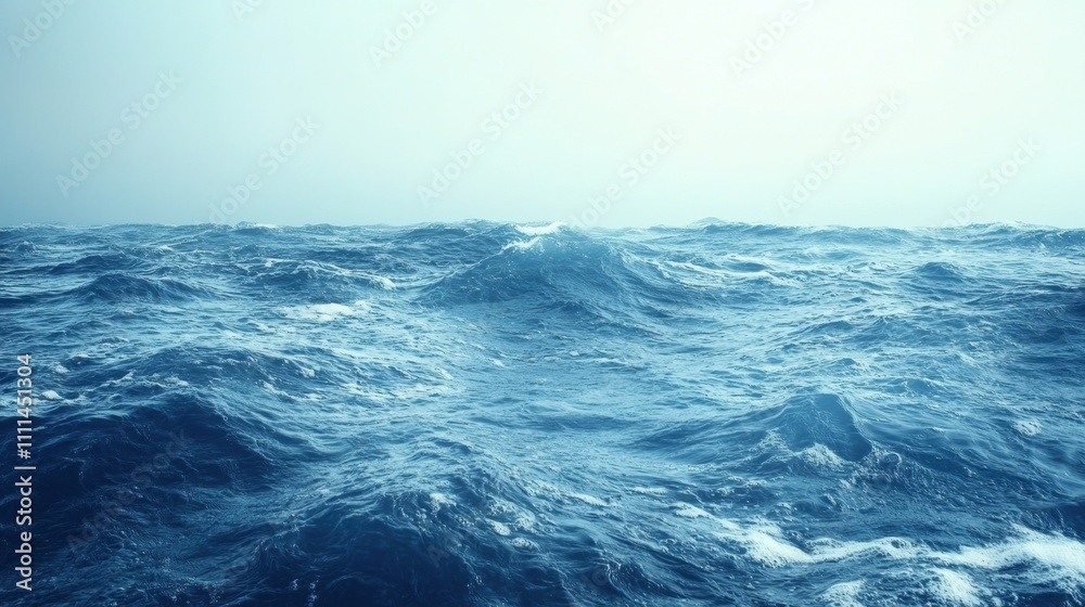 Expansive Tranquility of the Open Sea with Gentle Waves Under a Soft, Hazy Sky Capturing the Serene Beauty of Nature's Ocean Surface