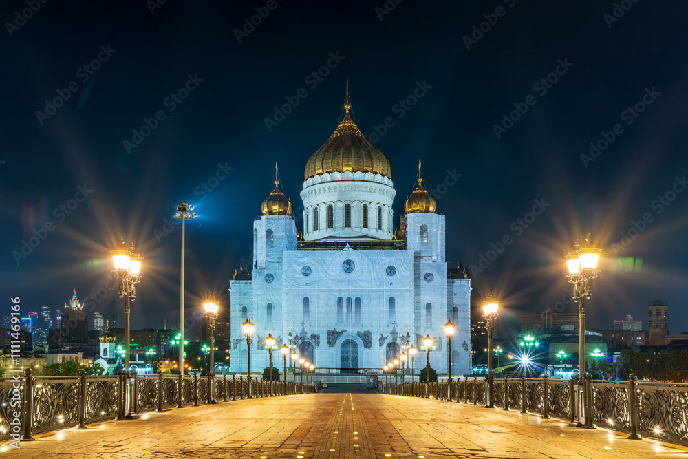 Cathedral of Christ the Savior and Patriarshy bridge at night in Moscow, Russia Cathedral of Christ the Savior and Patriarshy bridge at night in Moscow, Russia